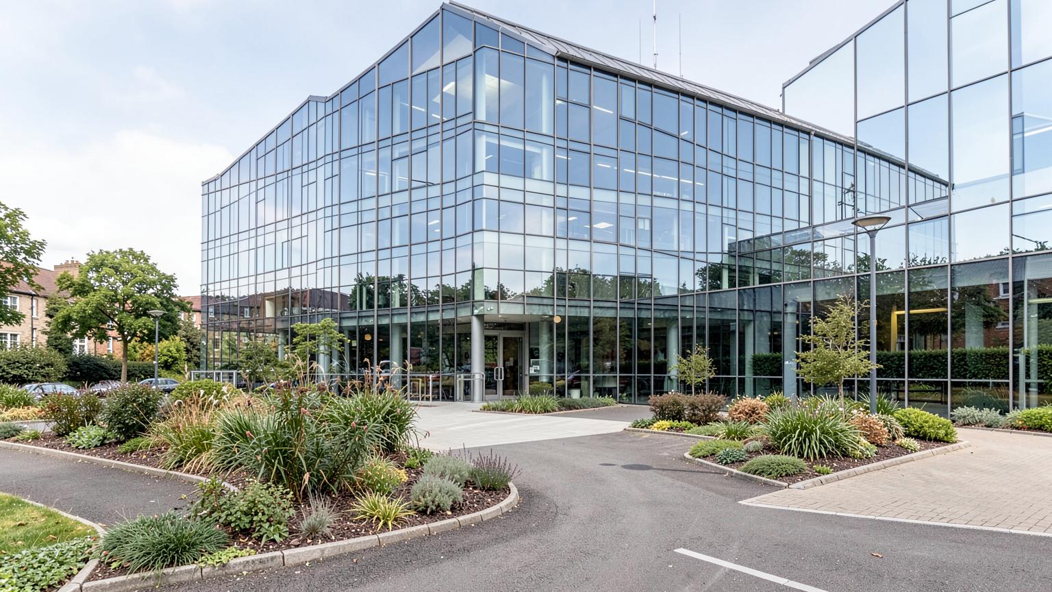 Glazed office building on a business park, the kind of let subject to MEES rules